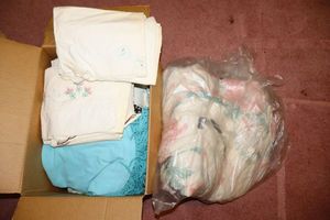 lot 117 image: Embroidered linens and vintage bed spreads