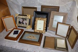 lot 69 image: Photo frames - new and vintage, one with large framed moth