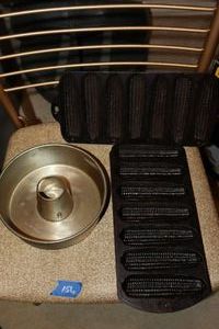 lot 156 image: Vintage small bundt pan and cast iron cornbread molds