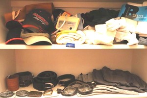 lot 187 image: Leather belts, riding goggles, belt buckles and shorts, plus leather carving set, see photos