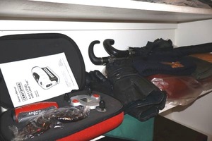 lot 188 image: Craftsman level with laser trac set, Harley Davidson hat, leather gloves, blanket and umbrellas