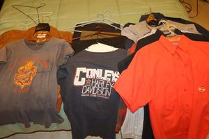 lot 195 image: Vintage Harley Davidson T-shirts, mens pants and shirts, Brown leather jacket by Silton size 44