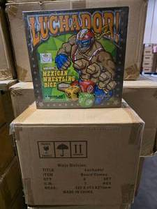 lot 54 image: NEW Ninja Division Luchador Mexican Wrestling Dice Board Game.  6 Boxes Per Case.  QUANTITY 3 CASES  BID IS TIMES THE QUANTITY SO YOU ARE BIDDING PER CASE