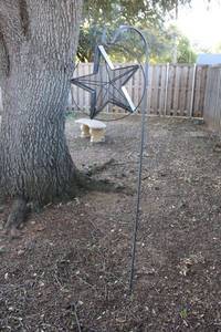 lot 77 image: Star bird feeder with shepherds hook