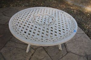 lot 75 image: Metal round patio table