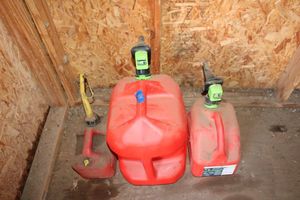 lot 84 image: Plastic gas cans