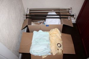 lot 100 image: Linens, curtain rods, shower curtains