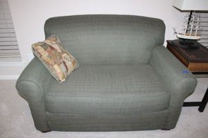 lot 58 image: Twin Sleeper by Hickory Springs - Oversized chair with sleeper pullout - 53w x 34d x 32h. Moss green color