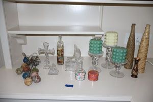 lot 111 image: Home dcor cut crystal pieces, hobnail pillar candles, hanging jugs, and vases