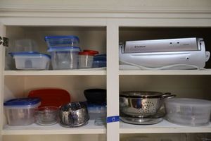 lot 14 image: Food saver, plastic food containers, strainers