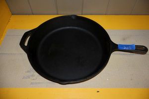 lot 208 image: Cast iron Lodge 13 skillet