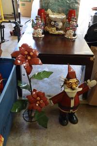 lot 186 image: Christmas decorations metal Santa and flower, Ceramic votive holders, vases and candy dish. Plus small flag holder with seasonal flags