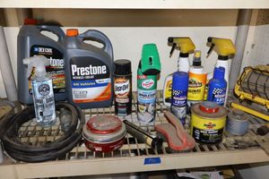 lot 170 image: Automotive lot antifreeze, car wax, grill cleaner, Armor All, wheel bearing grease, and more