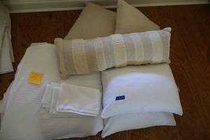 lot 230 image: FullQueen size white comforter and 2 shams plus decorative pillows