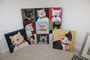 lot 104 image: Canvas cat wall art