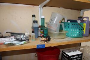 lot 204 image: Plastic tubing, cleaners, and garden faucet connector