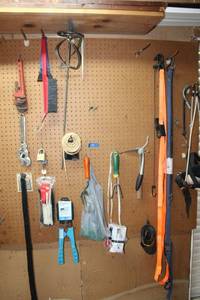 lot 197 image: Paint stirrer, windshield scrapers, wrenches, wire cutter, straps and garden tools