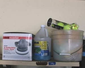 lot 156 image: Orbital polisher, Rain-X, tennis balls, sponges and rags