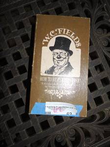 lot 62 image: W.C FIELDS How to be a great lover  SASPERILLA GOLD COLOGNE  IN  ORIGINAL BOX