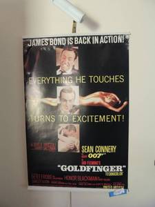 lot 68 image: James Bond is back in action GOLDFINGER wall poster