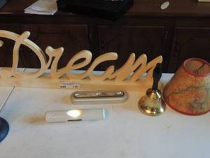 lot 110 image: dream wooden sign, small shade, hand held bell, small lights