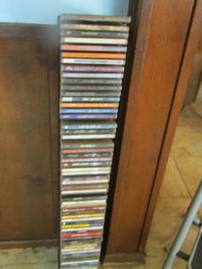 lot 191 image: various music Cds with cd stand