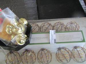 lot 313 image: string lights, jingle bells, black bowl