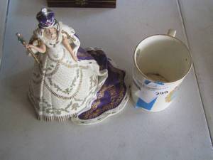 lot 299 image: queen Elizabeth doll and coffee cup