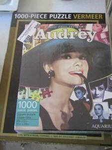 lot 300 image: Audrey 1000 piece puzzle and another puzzle