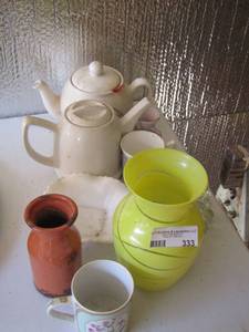 lot 333 image: metal handled tea pots, vases, coffee cups and open face reel