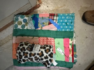 lot 209 image: Handmade Quilt. 66x78  leopard print throw