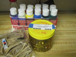 lot 2084 image: small container of screws and various art paints