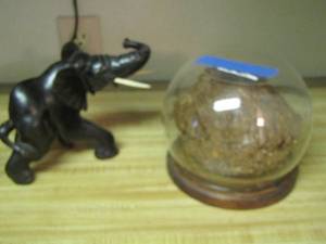 lot 2107 image: black elephant, elephant feces