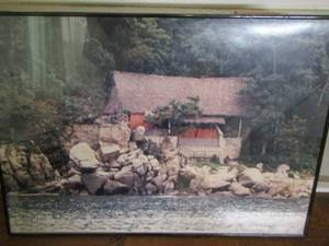 lot 2133 image: mountain side cabin on lake framed art