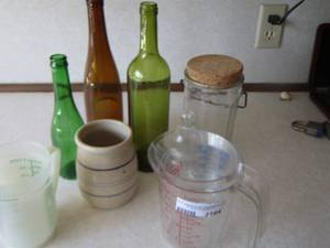 lot 2164 image: vinegar and oil bottles used for dcor- measuring cups - plus