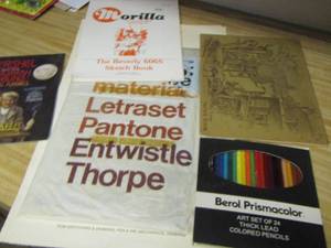 lot 2275 image: color pencils , books