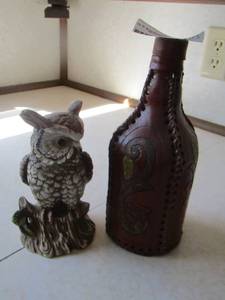 lot 2167 image: leather covered bottles- owl dcor