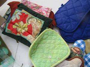 lot 2403 image: hand mittens, oven towels, rulers