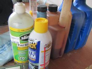 lot 2419 image: tire seal, silicone, sae hd-30, bar and chain oil