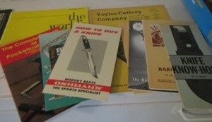 lot 2461 image: knife book lot