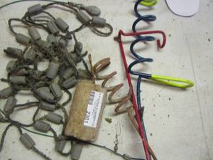 lot 2301 image: fishing pole holders, weights on rope