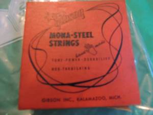 lot 2613 image: Gibson Mona steel guitar strings 3 sets of four banjo