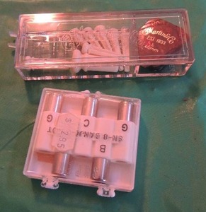 lot 2617 image: Pitch pipe guitar bridge pins and pics Marten