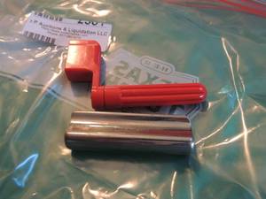 lot 2584 image: AP&M slide bar  and red string tightener