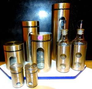 lot 87 image: 8 PIECE STAINLESS STEEL CANISTER, SALT & PEPPER, & OIL SET