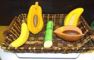 lot 125 image: BASKET WITH ASSORTED MEXICAN TERRA COTTA FRUIT