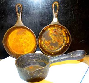 lot 126 image: (2X) Lodge 6.5 35 K Cast Iron Skillet Pans & Cast Iron Melting Pot (need cleaning)