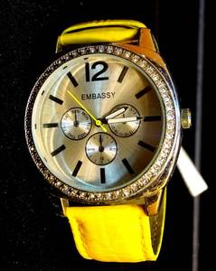 lot 136 image: BOLD FACE EMBASSY JEWEL BEZEL QUARTZ WATCH - YELLOW LEATHER BAND $$