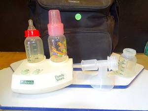 lot 217 image: AMEDA BABY BAG WITH BREAST MILK SUPPLIES