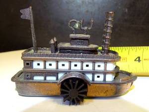 lot 251 image: VINTAGE DIE CAST METAL STEAM PADDLE BOAT PENCIL SHARPENER